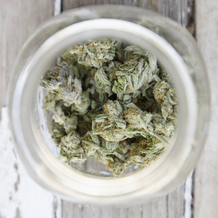 Closeup of Cannabis buds in jar